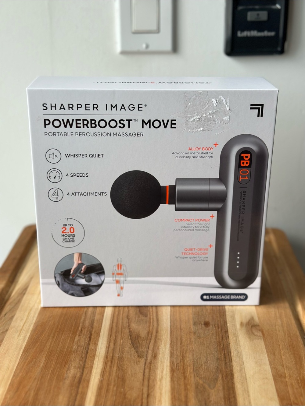 Sharper Image PowerBoost Move Percussion Massager — Black with Orange Accent